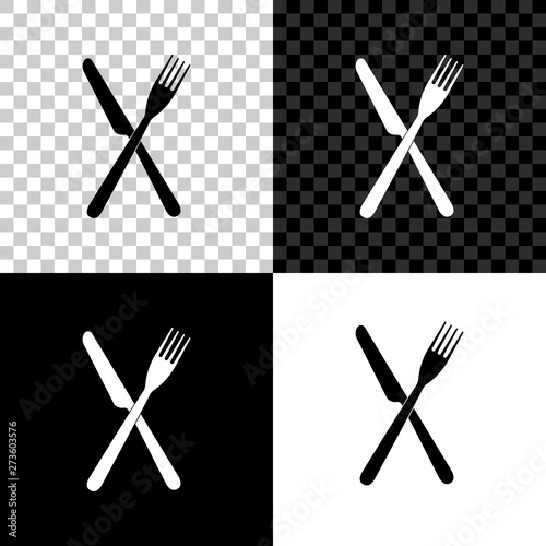 Crossed fork and knife icon isolated on black, white and transparent background. Restaurant icon. Vector Illustration