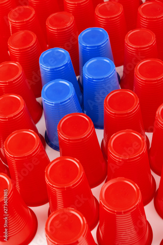 Large group of disposable plastic cups, red and blue