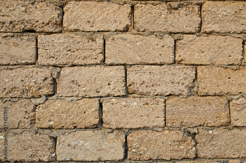 The masonry walls bonded with cement. Background.