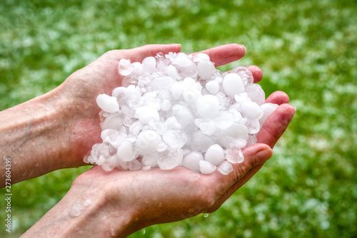 Hails in hands. Hailstorm