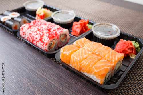 Takeaway sushi set fast food delivery concept image