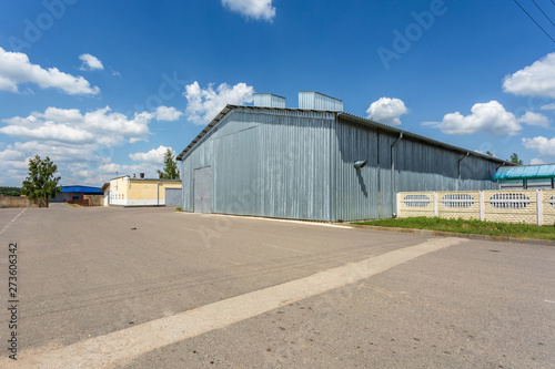 Hangar for fruits and vegetables in storage stock. production warehouse. Plant Industry © hiv360