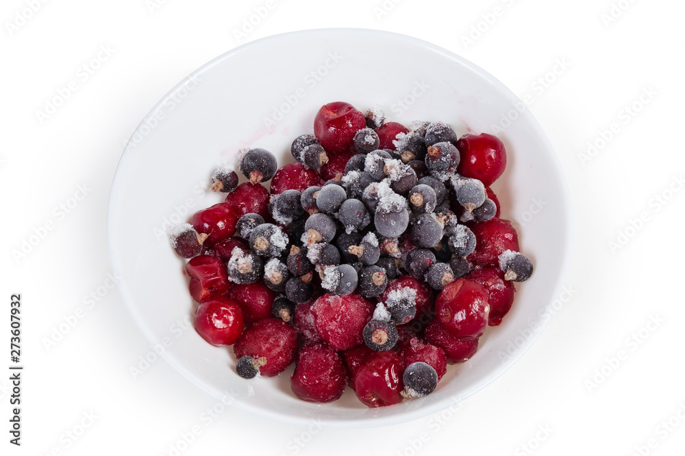 Various frozen berries in bowl on a white background Various frozen berries in bowl on a white background