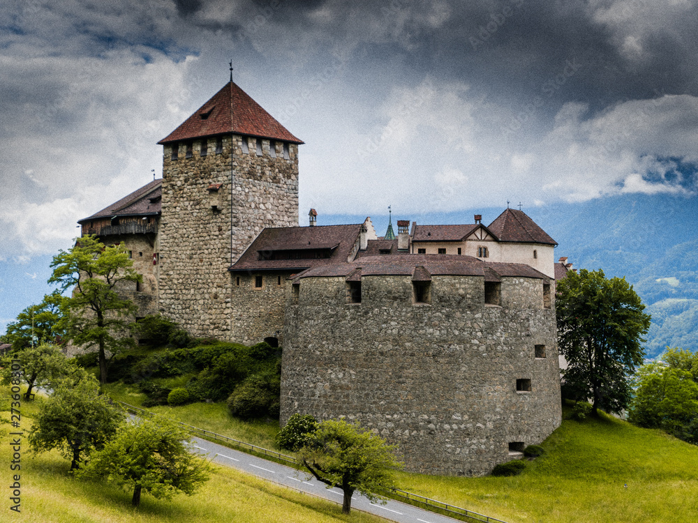 A view of the historic Vaduz Castle in the capital of the Principality of Liechtenstein on an overcast summer day