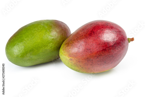 Two ripe mango fruits on a white background