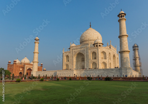 Agra, India - probably the most recognizable landmark of India, the Taj Mahal is an ivory-white marble mausoleum dedicated to the Emperess Mumtaz Mahal. Here in the picture it's unmistakable shape