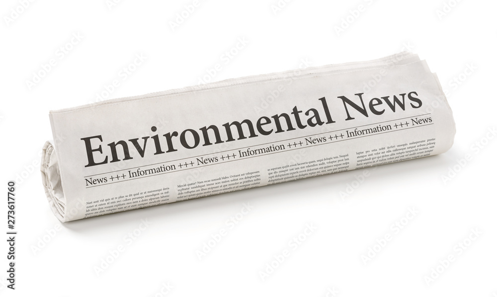 Rolled newspaper with the headline Environmental News - obrazy, fototapety, plakaty 