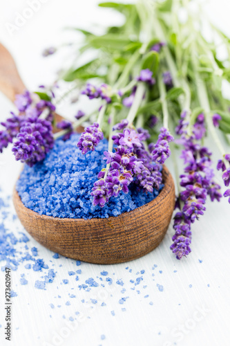 Essential lavender salt with flowers top view.