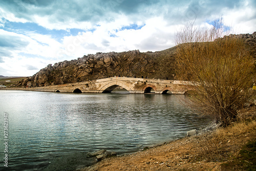 Çeşnigir Bridge is the historical Ottoman bridge on the Kızılırmak River in Kırıkkale province, Turkey photo