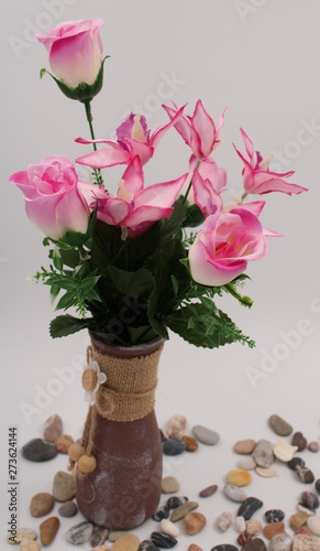 Vase with pink roses and lilies