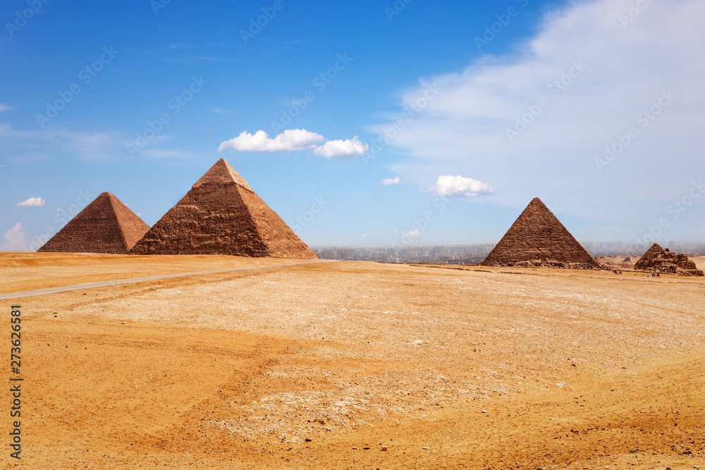 Sunny day in Giza desert, view on the Pyramids