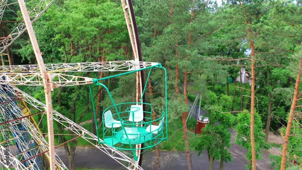 Old ferris wheel in the park near the forest and river. Part 7 Old ferris wheel in the park near the forest and river. Part 7