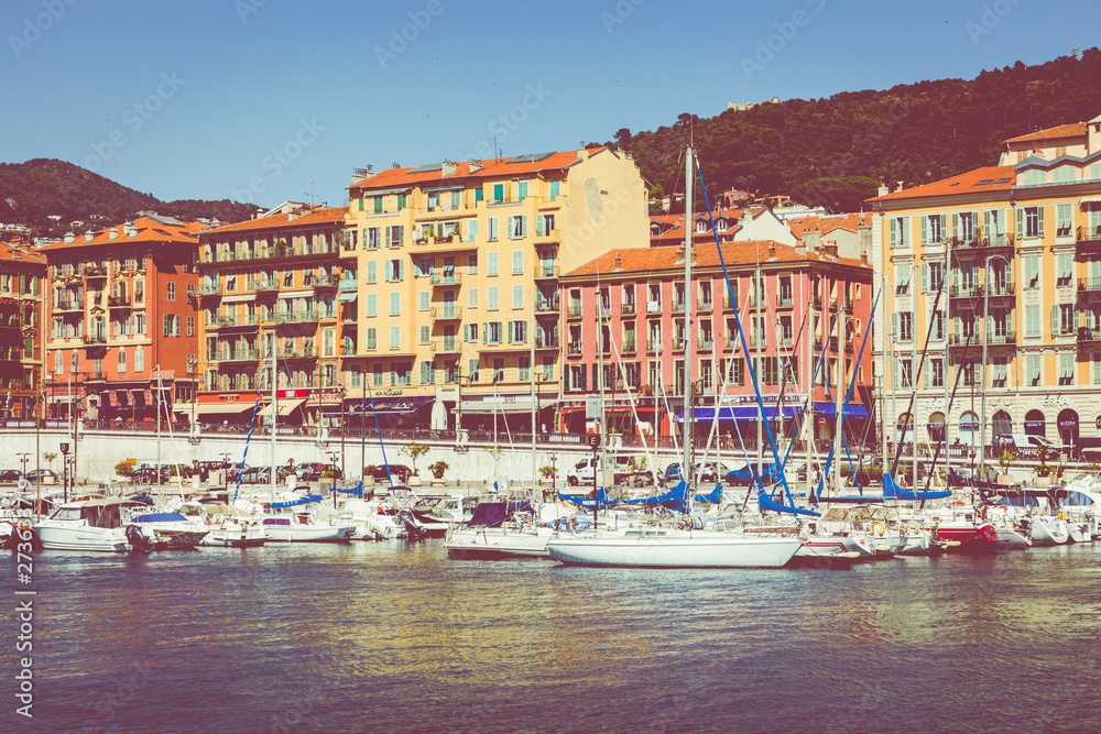 Old port of Nice. Yachts and fishing boats moored in the harbor of Nice, Cote d'Azur, France.