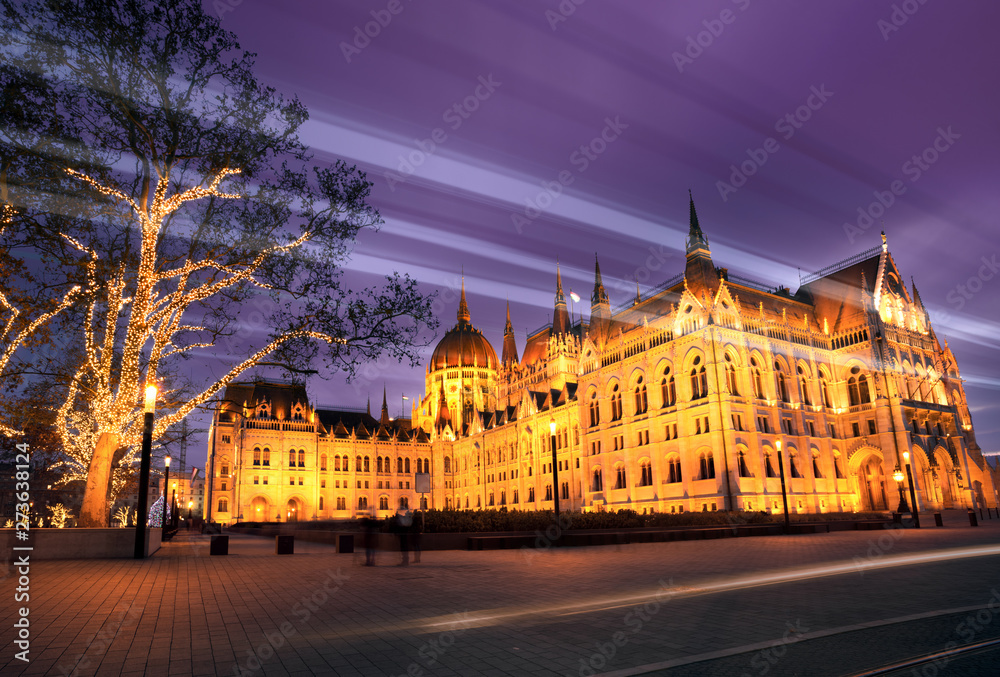 Hungarian Parliament in Budapest at night, lighting trail