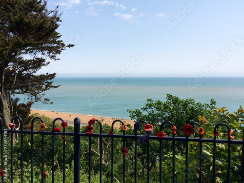Memorial poppy railings above beach in Folkstone, Kent, UK