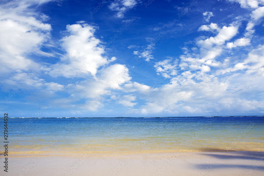 Caribbean sea and clouds sky. Travel background.