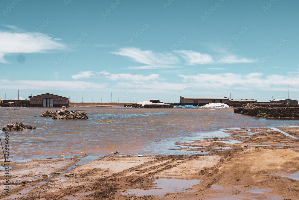 Brown and muddy salt flats in Salar de Uyuni