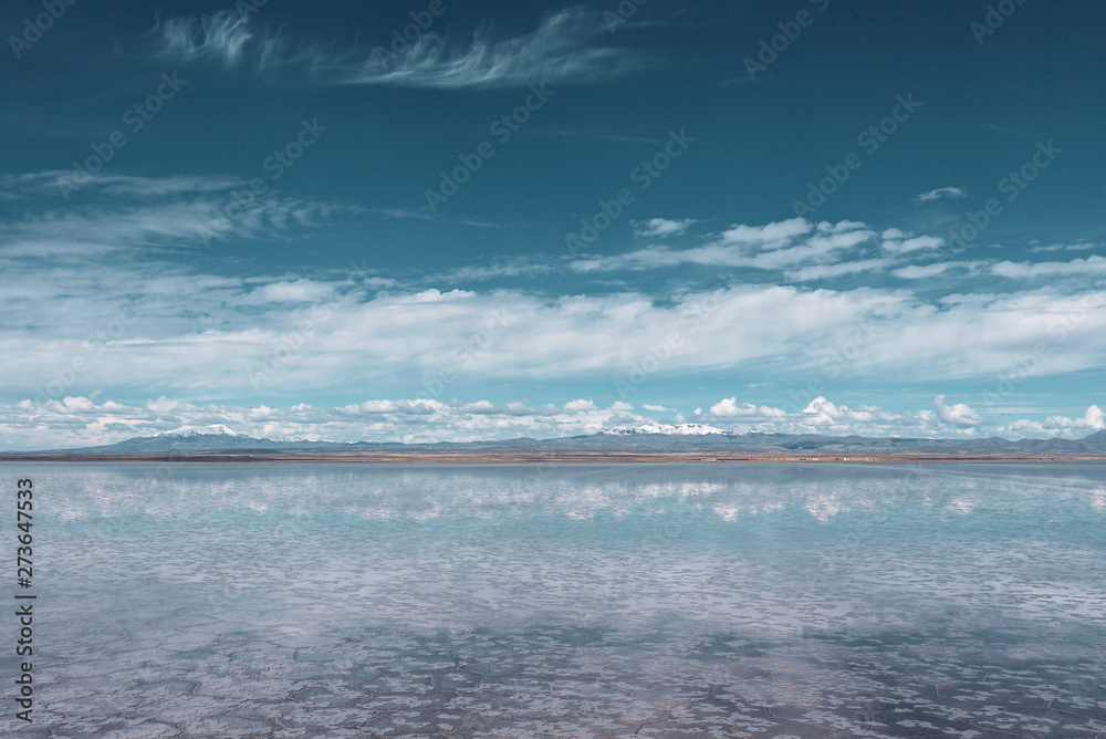 Endless landscapes with reflection like mirror of sky in Salar de Uyuni, Bolivia