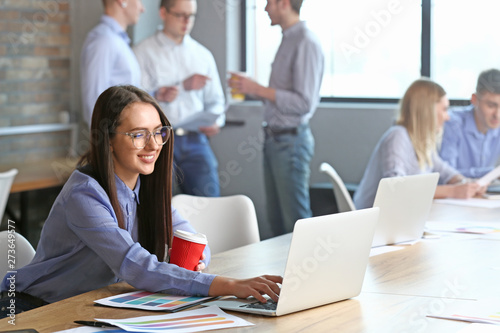 Young woman during business meeting in office