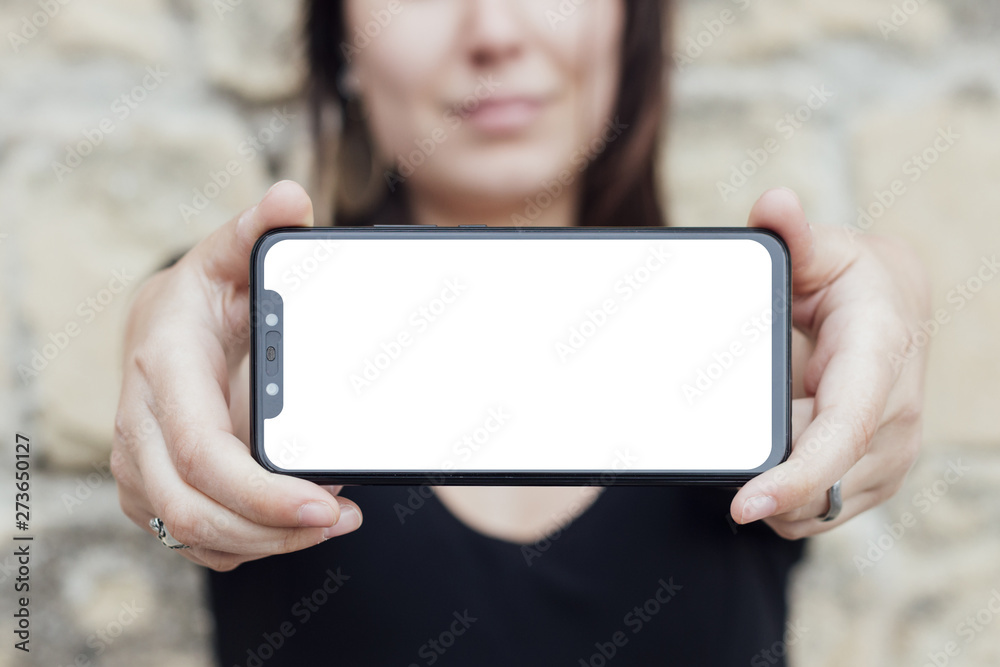 Smartphone screen hold by a person