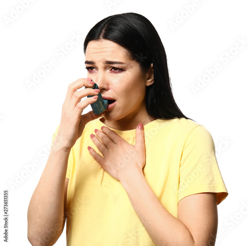 Young woman having asthma a...