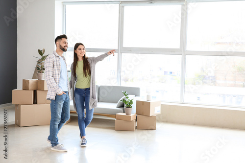 Young couple in their new house