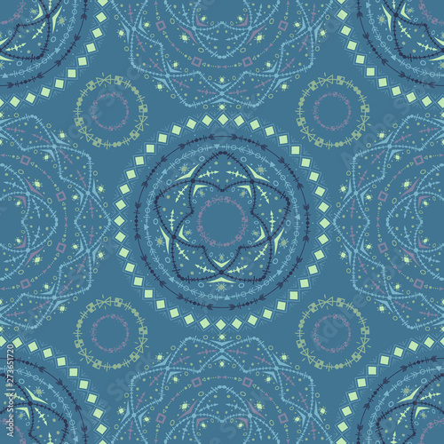 Ethnic seamless pattern with tribal ornaments. Boho geometrical pattern. Blue colors