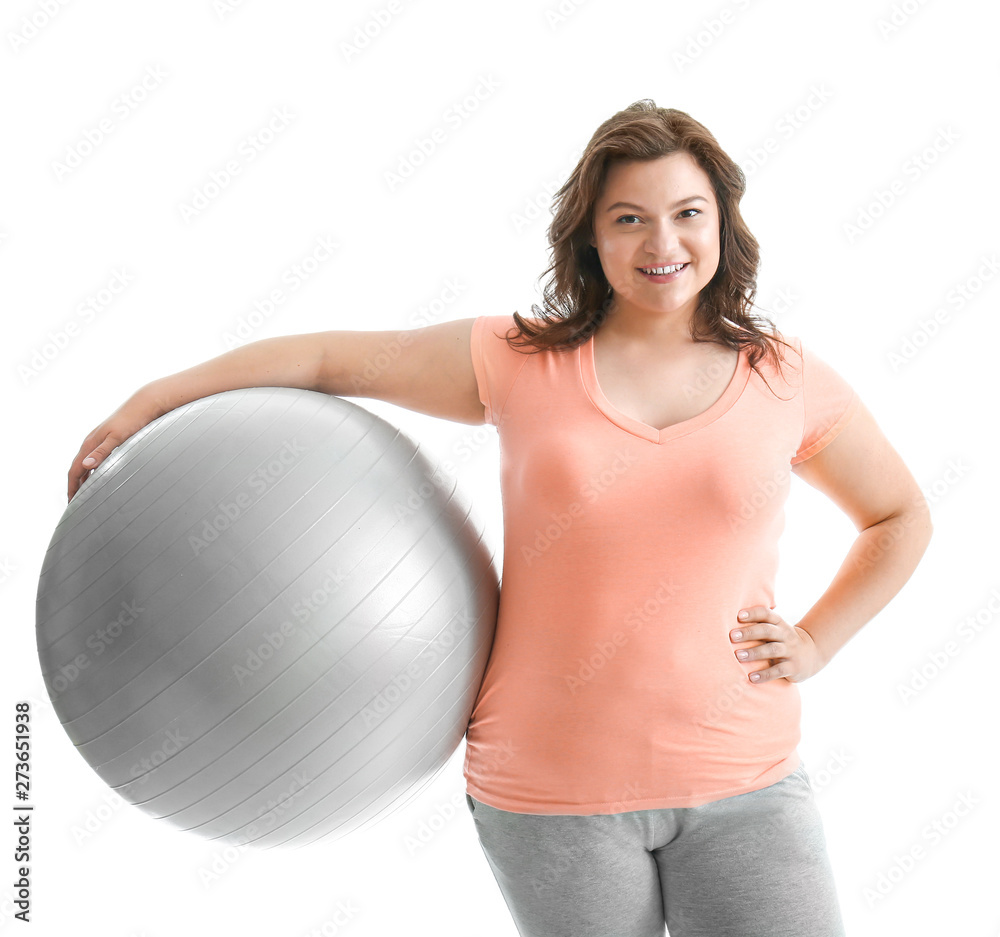 Plus size woman with fitball on white background. Concept of weight loss Plus size woman with fitball on white background. Concept of weight loss