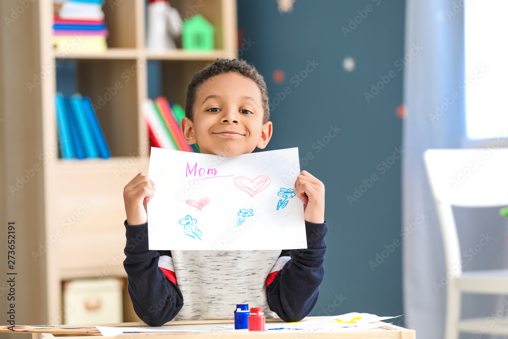 Cute African-American boy drawing at home - obrazy, fototapety, plakaty 