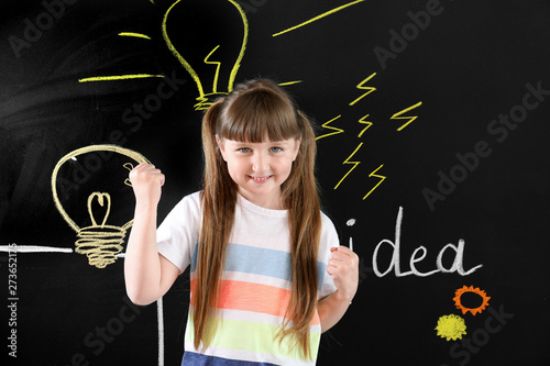 Little girl near drawn ligh...