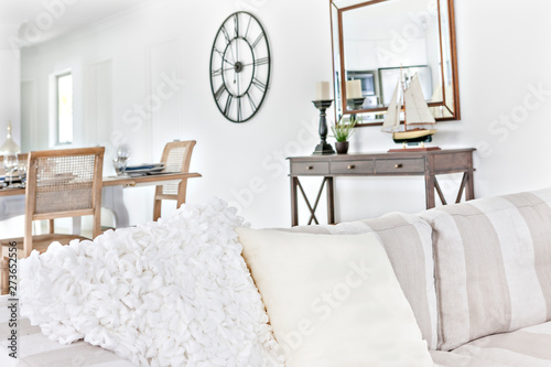 Luxury looking white sofa set near wooden table. photo