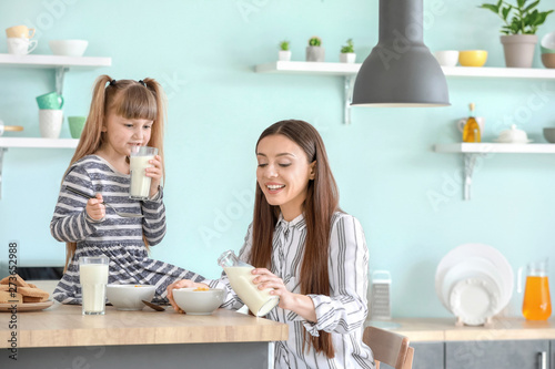 Young mother with little da...