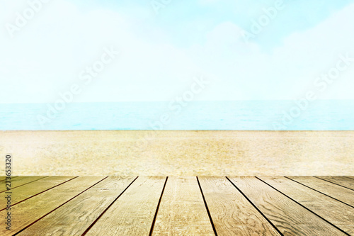 Table top with beach background  sky and cloud in sunny day for product display job showing. Wooden table for display or montage your products.