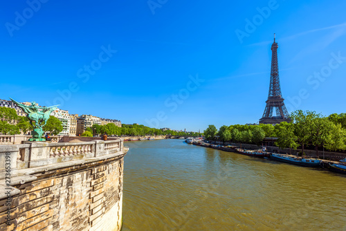 View of Eiffel tower beside Seine river in Paris, France.