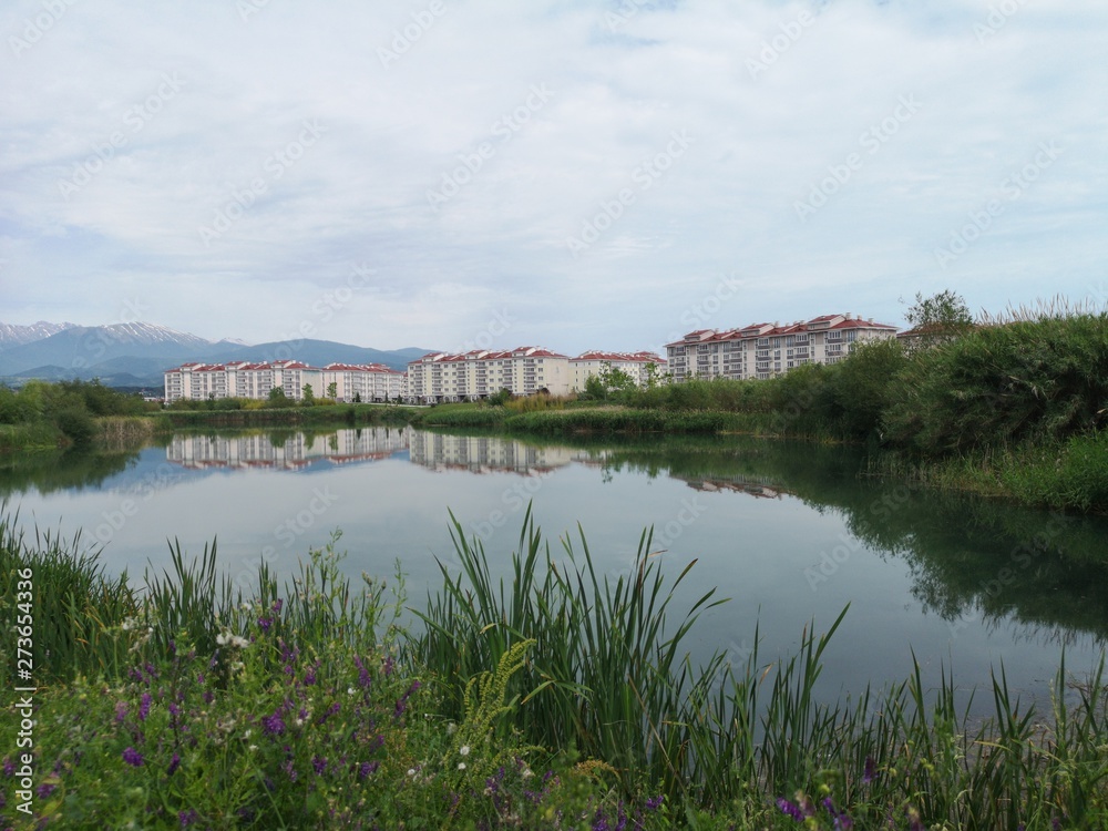 Fototapeta premium landscape with lake and blue sky