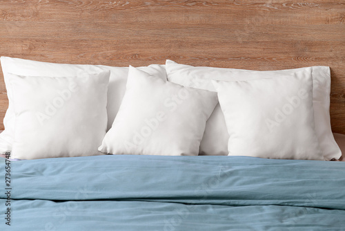 Fototapeta Naklejka Na Ścianę i Meble -  Cozy bed with soft pillows