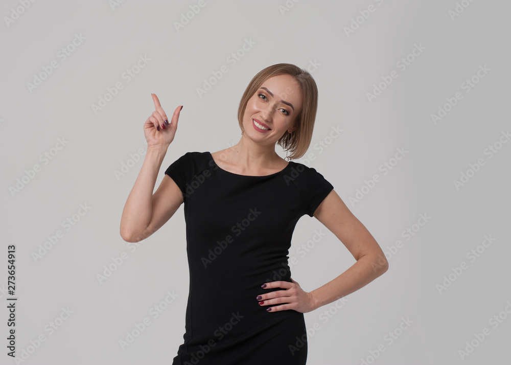 Young charming female manager or business woman wearing black outfit Young charming female manager or business woman wearing black outfit