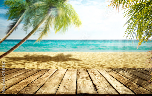 Wooden table of free space and summer background 