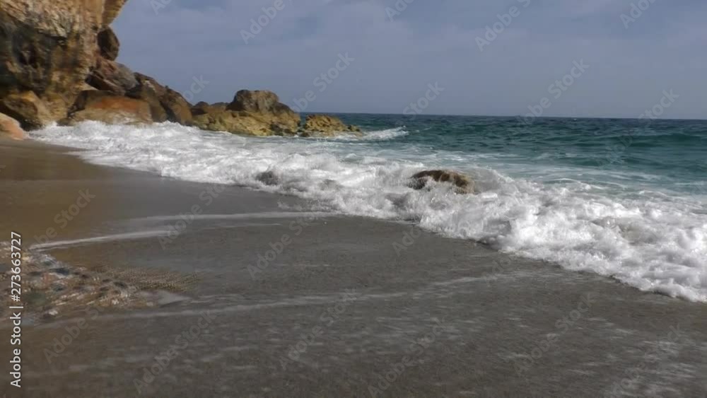 Sea wave incident on the beach and beating on the rocks. Sea wave incident on the beach and beating on the rocks.