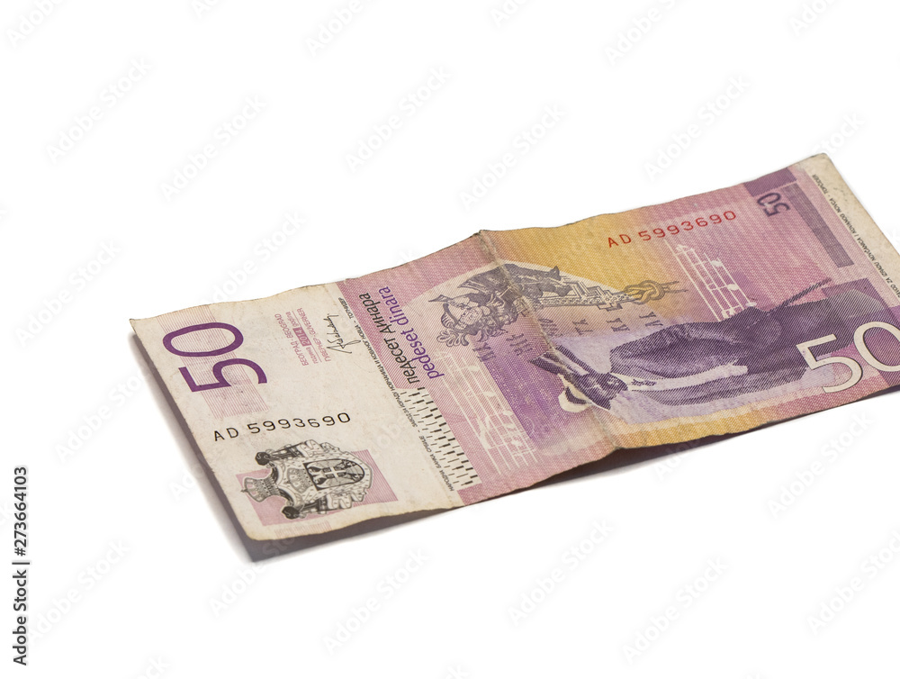 One banknote worth 50 Serbian Dinars with a portrait of violinist Stevan Mokranyats isolated on a white background One banknote worth 50 Serbian Dinars with a portrait of violinist Stevan Mokranyats isolated on a white background