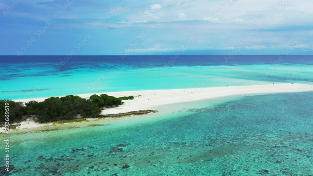Aerial view of a long white strip of sand in the maldives islands in the Indian Ocean. Pure turquoise waters and white sand beach Aerial view of a long white strip of sand in the maldives islands in the Indian Ocean. Pure turquoise waters and white sand beach