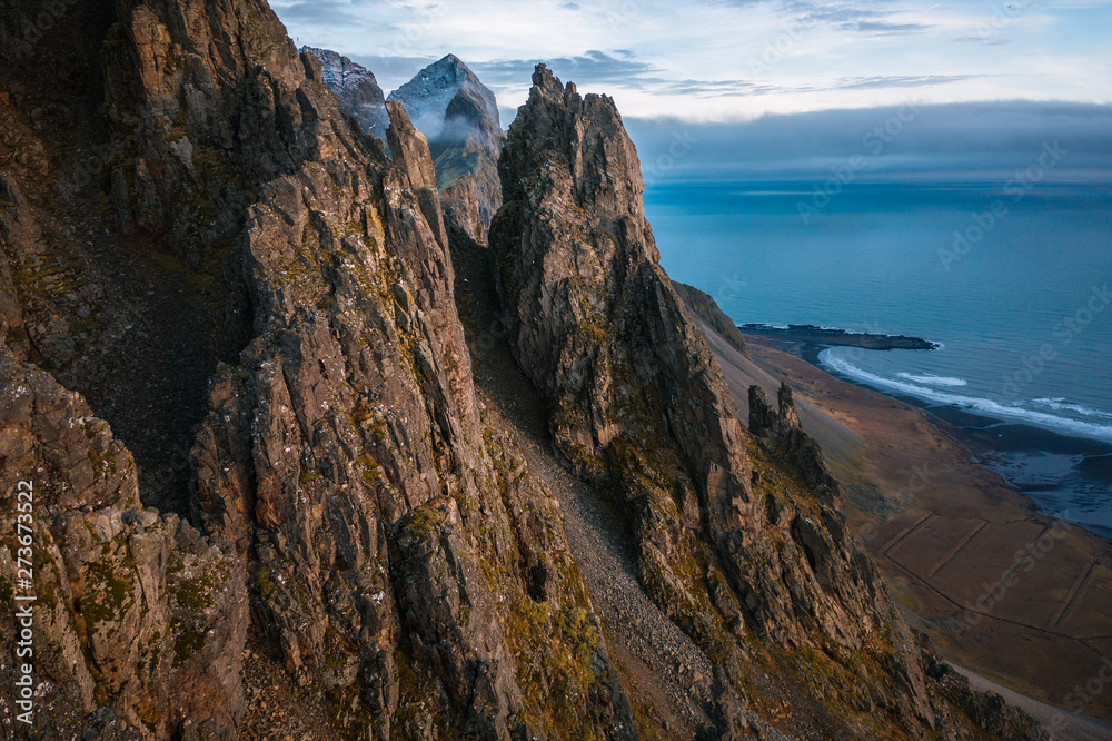 Scenic view of mountains at Stokksnes Beach during sunset Scenic view of mountains at Stokksnes Beach during sunset