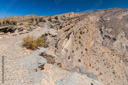 Rims of Wadi Ghul canyon in Hajar Mountains, Oman