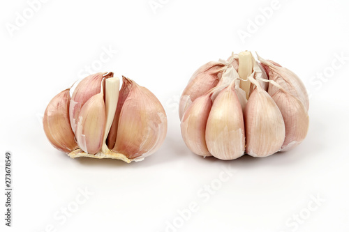 heads of garlic on a white background