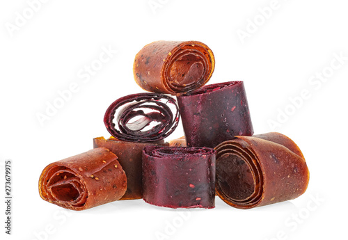 Delicious healthy fruit roll-ups isolated on a white background. Fruit pastille slices.