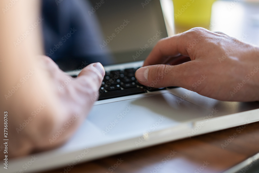 Man hands working on laptop Man hands working on laptop