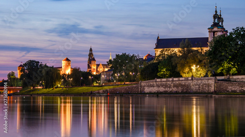 View from the water of the church and the castle in the evening.