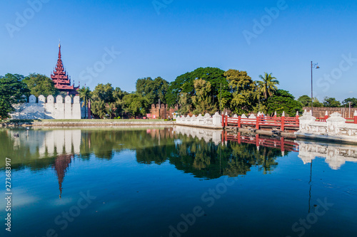 Moat, bridge, walls and a tower of Mandalay Fortress, Myanmar