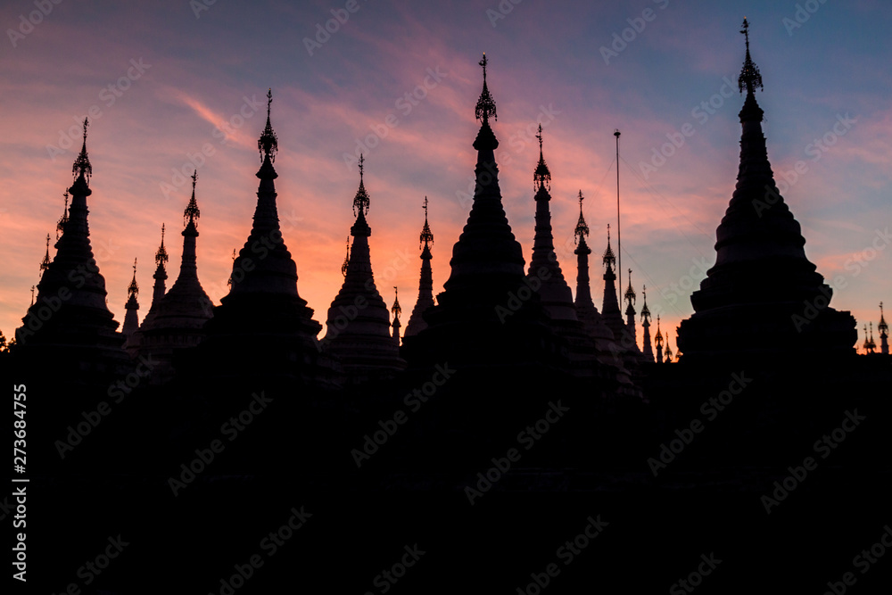 Stupas around Sandamuni (Sandamani or Sandar Mu Ni)  pagoda during dusk in Mandalay, Myanmar