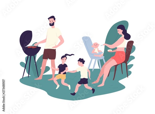 Happy family spending time at summer barbeque party. Funny mother, father and...